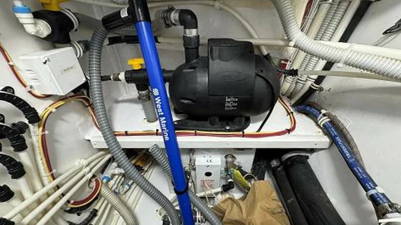 Slide: The Image of 2007 74 Viking 74 Enclosed Bridge Never Settle - Fresh Water Pump and Water Heater - 6312574