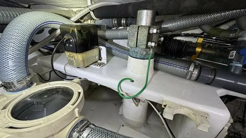 Slide: The Image of 2007 74 Viking 74 Enclosed Bridge Never Settle - Rudder Shelf to Starboard - 6312582