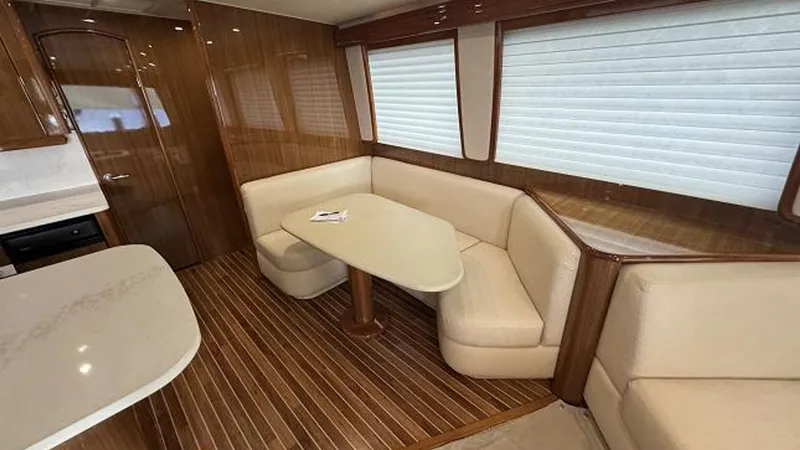 Slide: The Image of 2007 74 Viking 74 Enclosed Bridge Never Settle - Dinette - 6312548