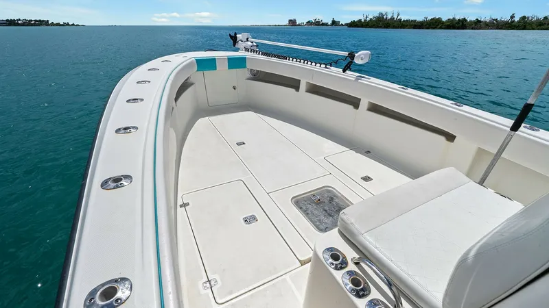 Slide: The Image of Spacious Bow with Seating The bow of the 2015 SeaVee 320Z offers an expansive deck space ideal for fishing and relaxation. Featuring integrated seating and ample storage hatches, this area is designed for both comfort and functionality. The clean lines and durable materials ensure - 6312129