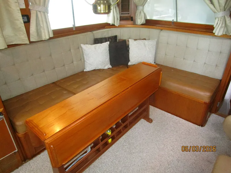 Slide: The Image of 46' Grand Banks salon starboard seating - 6284957