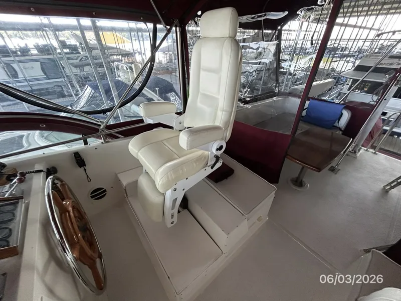 Slide: The Image of 46' Grand Banks flybridge starboard forward seating - 6284912