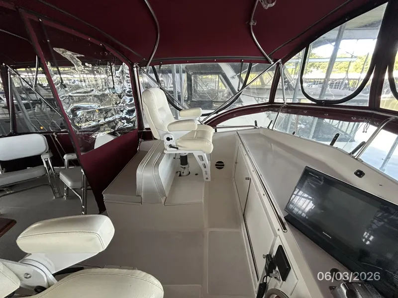 Slide: The Image of 46' Grand Banks flybridge port forward - 6284907