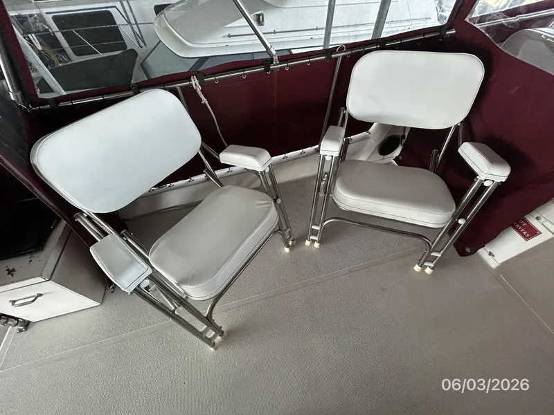 Slide: The Image of 46' Grand Banks flybridge port aft seating - 6284906