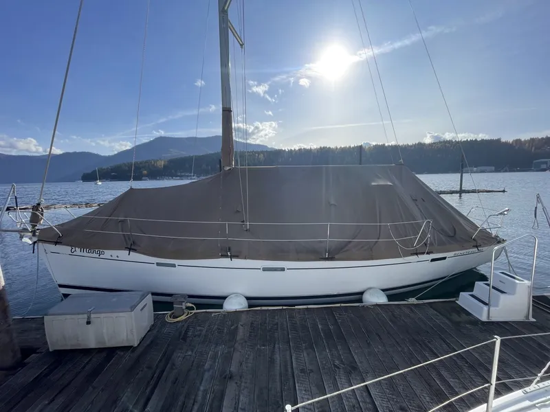 Slide: The Image of 2007 Beneteau 393 sailboat docked with full cover - 6290735