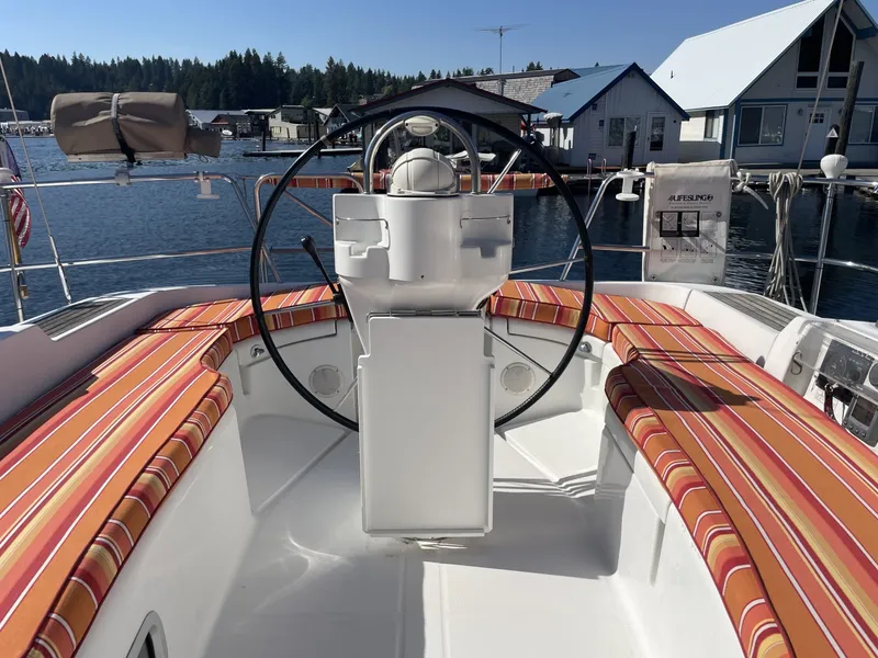Slide: The Image of Cockpit of 2007 Beneteau 393 sailboat with striped seating - 6290722