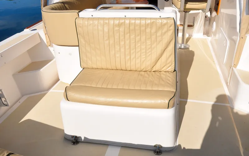 Slide: The Image of Hunt Surfhunter 29 - Judith Ann 2005 Hunt Yachts Surfhunter 29 interior with beige leather seating. - 6302500