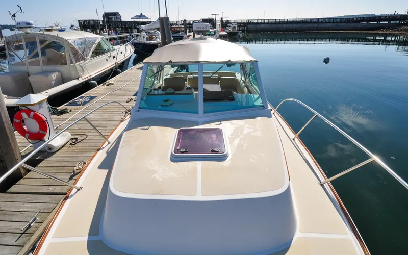 Slide: The Image of Hunt Surfhunter 29 - Judith Ann 2005 Hunt Yachts Surfhunter 29 docked at marina, calm water reflection. - 6302479
