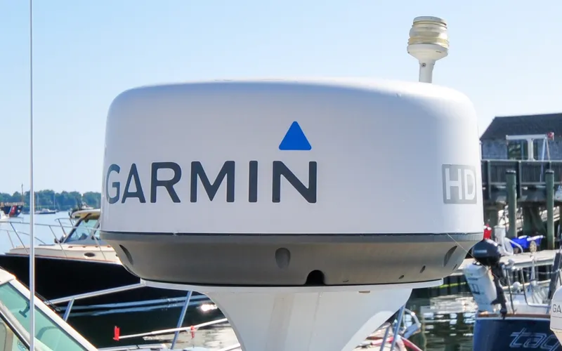 Slide: The Image of Hunt Surfhunter 29 - Judith Ann Garmin radar on 2005 Hunt Yachts Surfhunter 29, docked in a marina. - 6302508