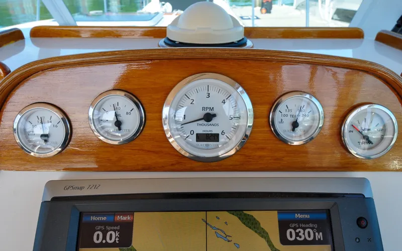 Slide: The Image of Hunt Surfhunter 29 - Judith Ann Dashboard of 2005 Hunt Yachts Surfhunter 29 with gauges and GPS display. - 6302493