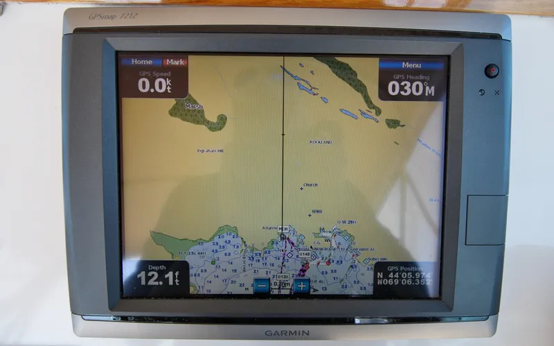 Slide: The Image of Hunt Surfhunter 29 - Judith Ann Garmin GPS display on 2005 Hunt Yachts Surfhunter 29, showing navigation map and data. - 6302492