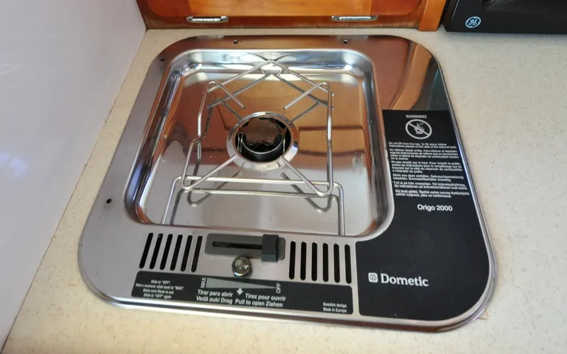 Slide: The Image of Hunt Surfhunter 29 - Judith Ann Dometic Origo 2000 stove on 2005 Hunt Yachts Surfhunter 29, compact marine kitchen appliance. - 6302529