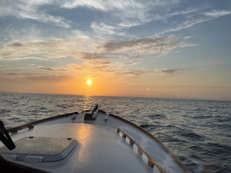 Slide: The Image of 2002 Lyman-Morse Monhegan 30 - Halcyone Cruising across the bay at 20kts, enjoying the sunset in comfort. - 6306075
