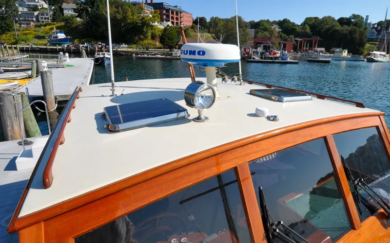 Slide: The Image of 1958 Bunker and Ellis 42 | Aleria 1958 Bunker and Ellis 42 boat docked at a marina, showcasing its classic design. - 6307476