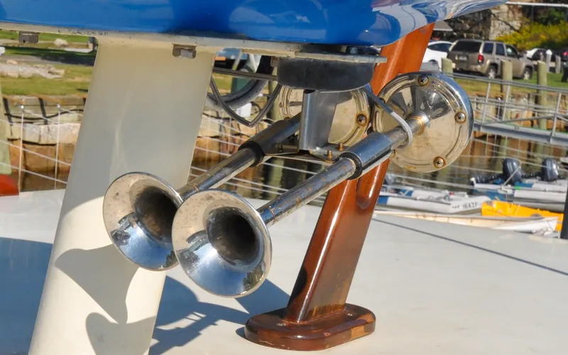 Slide: The Image of 1958 Bunker and Ellis 42 | Aleria Close-up of dual chrome horns on a 1958 Bunker and Ellis 42 boat. - 6307479
