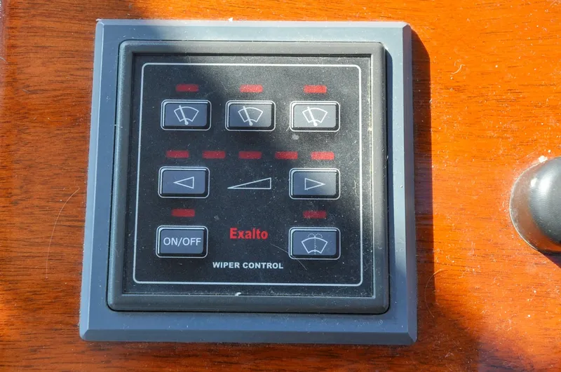 Slide: The Image of 1958 Bunker and Ellis 42 | Aleria Control panel for wipers on a 1958 Bunker and Ellis 42 boat. - 6307490