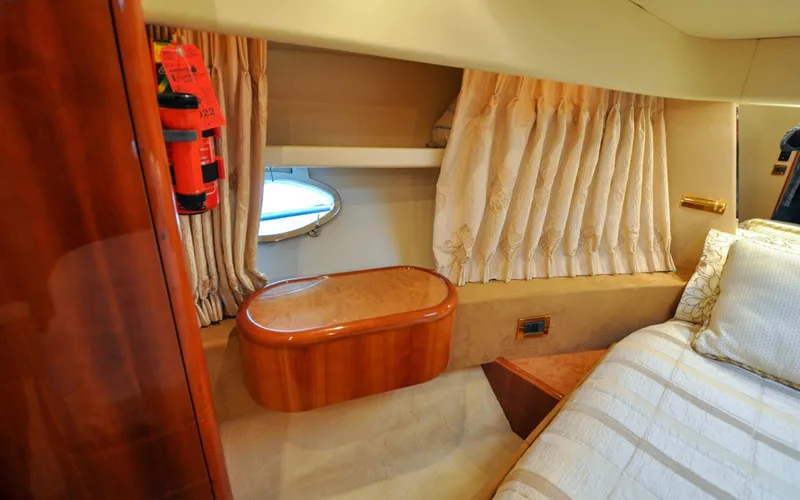 Slide: The Image of 1996 Azimut 54 | Calmati Luxurious 1996 Azimut Cinquantaquattro yacht interior with elegant wood and fabric details. - 6308949