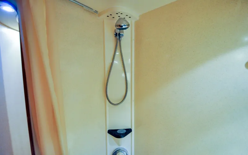 Slide: The Image of 1996 Azimut 54 | Calmati Shower area in 1996 Azimut Cinquantaquattro yacht, featuring modern fixtures and beige walls. - 6308962