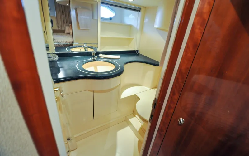 Slide: The Image of 1996 Azimut 54 | Calmati Luxurious bathroom interior of 1996 Azimut Cinquantaquattro yacht with elegant fixtures. - 6308969