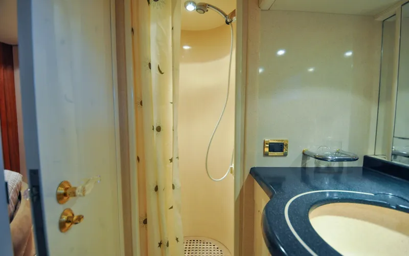 Slide: The Image of 1996 Azimut 54 | Calmati Luxurious bathroom interior of 1996 Azimut Cinquantaquattro yacht with shower and sink. - 6308968