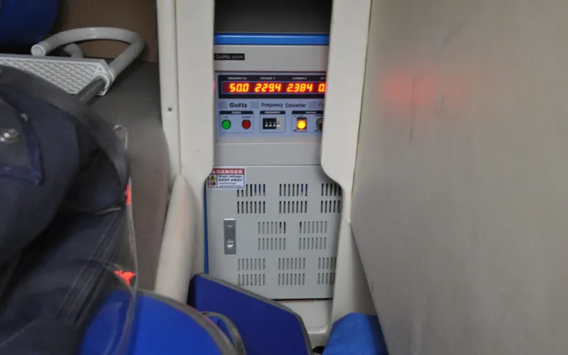 Slide: The Image of 1996 Azimut 54 | Calmati Electrical equipment inside a 1996 Azimut Cinquantaquattro yacht, displaying frequency and voltage readings. - 6308837