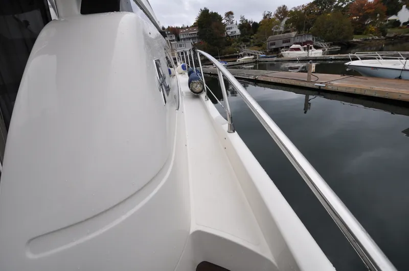 Slide: The Image of 1996 Azimut 54 | Calmati Side view of 1996 Azimut Cinquantaquattro yacht docked at marina. - 6308580