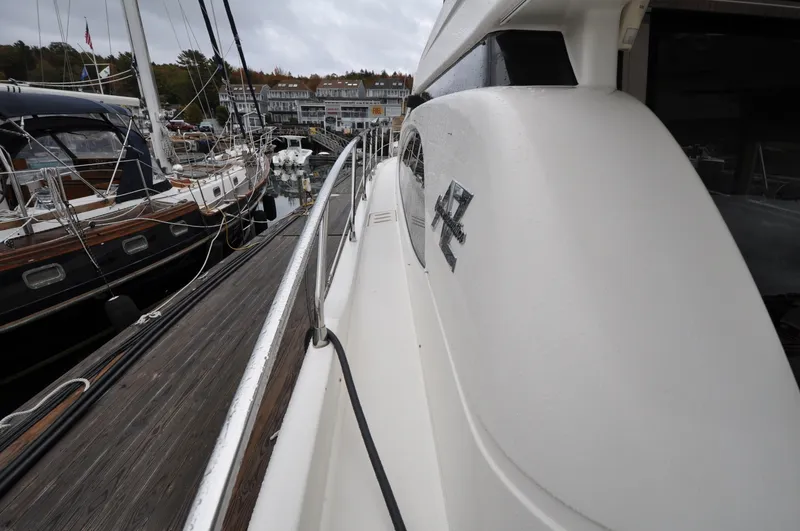 Slide: The Image of 1996 Azimut 54 | Calmati Side view of 1996 Azimut Cinquantaquattro yacht docked at marina. - 6308582