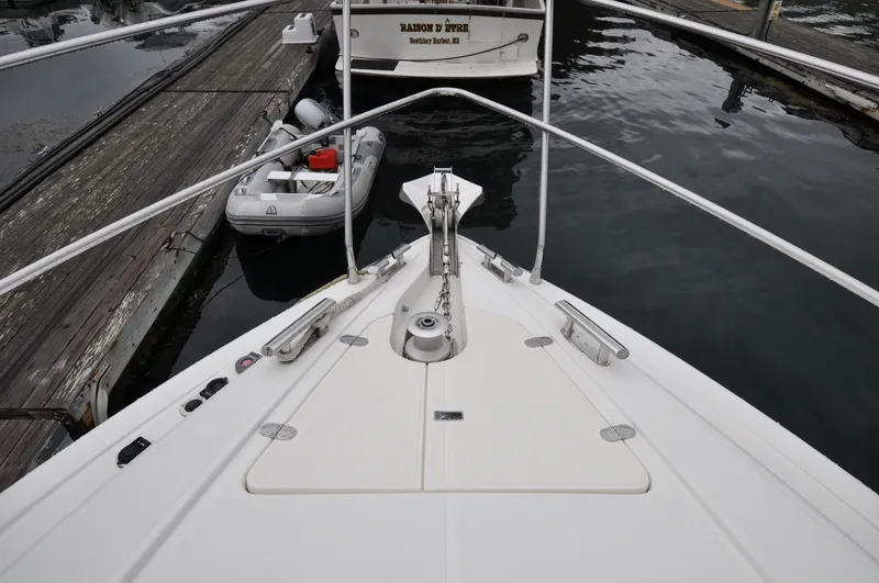 Slide: The Image of 1996 Azimut 54 | Calmati Bow view of 1996 Azimut Cinquantaquattro yacht docked at marina. - 6308592