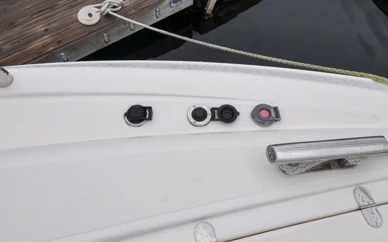 Slide: The Image of 1996 Azimut 54 | Calmati 1996 Azimut Cinquantaquattro yacht deck with mooring cleat and fuel caps. - 6308875