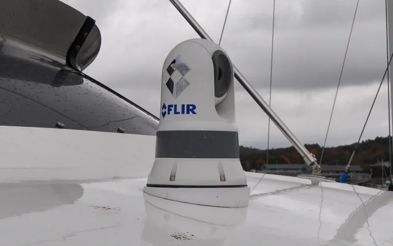 Slide: The Image of 1996 Azimut 54 | Calmati FLIR camera on 1996 Azimut Cinquantaquattro yacht under cloudy sky. - 6308882