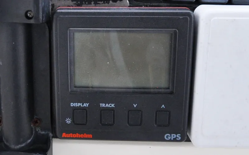 Slide: The Image of Autopilot control panel on 1996 Azimut Cinquantaquattro yacht, featuring Autohelm ST6000. Autopilot GPS display on 1996 Azimut Cinquantaquattro yacht dashboard. - 6308894