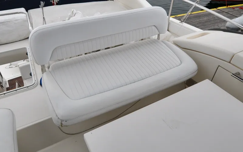 Slide: The Image of 1996 Azimut 54 | Calmati White seating area on a 1996 Azimut Cinquantaquattro yacht deck. - 6308901