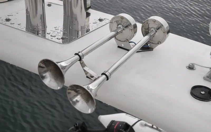 Slide: The Image of 1996 Azimut 54 | Calmati Chrome boat horns on a 1996 Azimut Cinquantaquattro yacht, mounted on a white surface. - 6308909