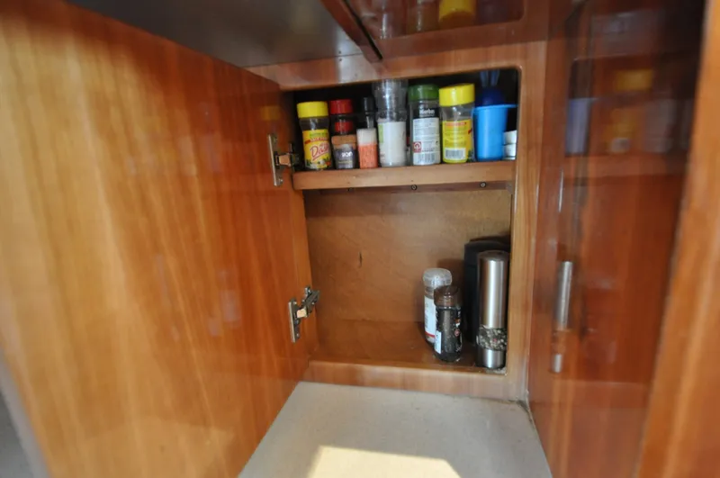 Slide: The Image of 1996 Azimut 54 | Calmati Wooden cabinet with spices and condiments on an Azimut Cinquantaquattro yacht, 1996 model. - 6308629