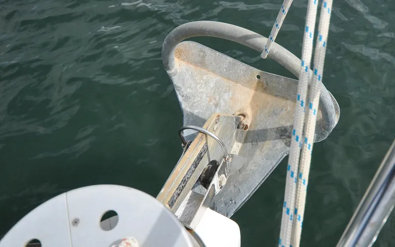 Slide: The Image of 1993 Catalina 42 | Kanga Anchor of a 1993 Catalina 42 sailboat over calm water. - 6318863