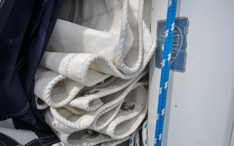 Slide: The Image of 1993 Catalina 42 | Kanga Folded sail and ropes on a 1993 Catalina 42 sailboat. - 6318866