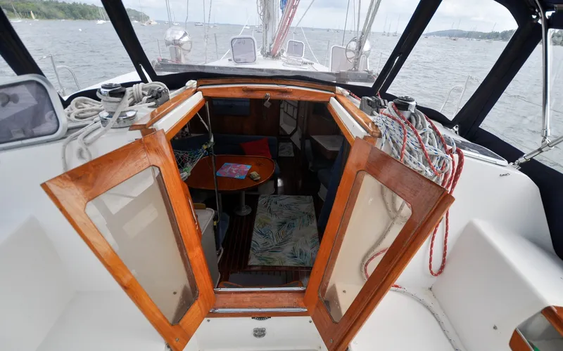 Slide: The Image of 1993 Catalina 42 | Kanga Interior view of 1993 Catalina 42 sailboat with open cabin doors. - 6318896