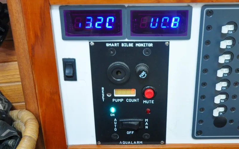 Slide: The Image of 1993 Catalina 42 | Kanga Smart bilge monitor panel on a 1993 Catalina 42 sailboat, displaying digital readings. - 6318909