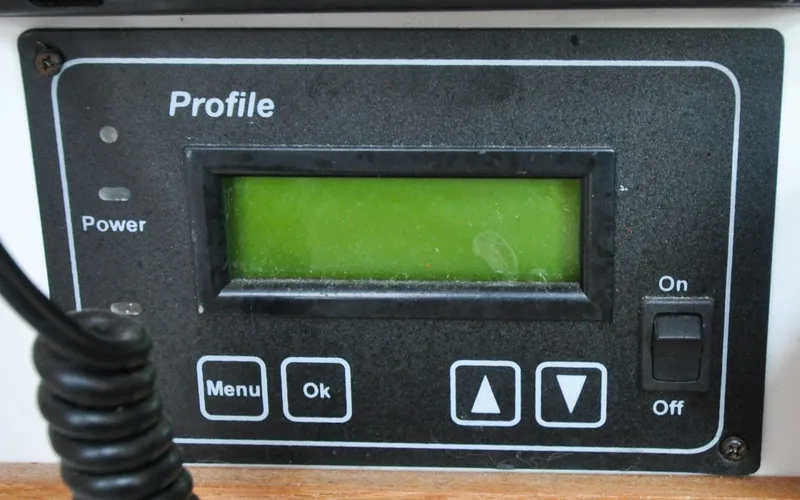 Slide: The Image of 1993 Catalina 42 | Kanga Control panel with display and buttons on a 1993 Catalina 42 sailboat. - 6318915