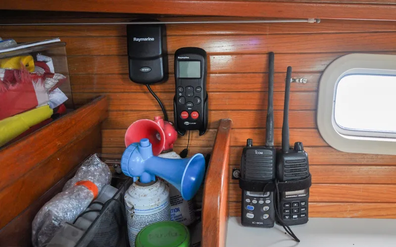 Slide: The Image of 1993 Catalina 42 | Kanga Interior of a 1993 Catalina 42 sailboat with communication devices and safety equipment. - 6318913