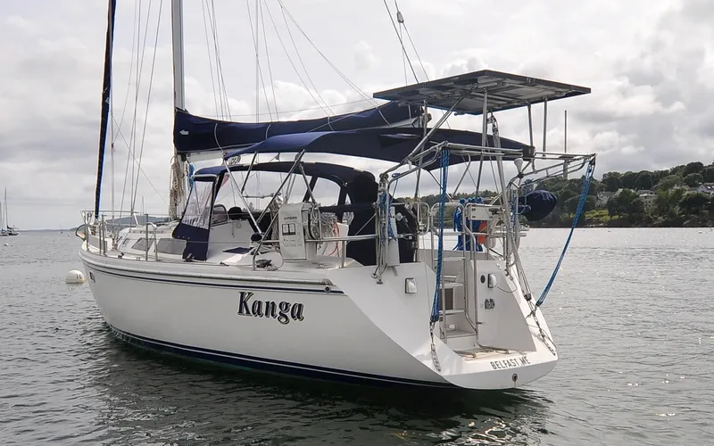 Slide: The Image of 1993 Catalina 42 | Kanga 1993 Catalina 42 sailboat on calm waters. - 6318840