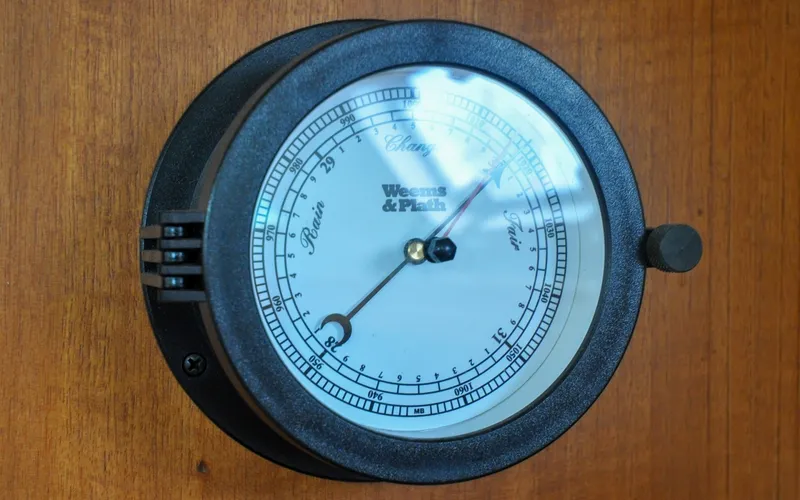 Slide: The Image of 1993 Catalina 42 | Kanga Barometer on 1993 Catalina 42 yacht, displaying atmospheric pressure, mounted on wooden panel. - 6318920