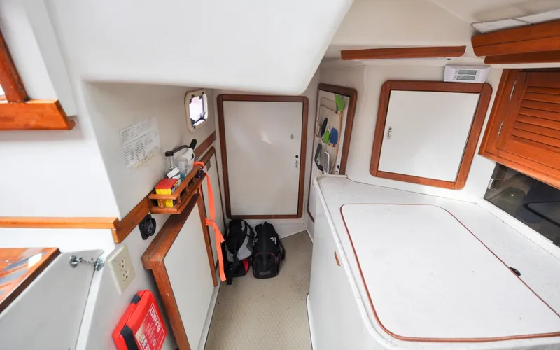 Slide: The Image of 1993 Catalina 42 | Kanga Interior of a 1993 Catalina 42 sailboat with storage and equipment. - 6318932