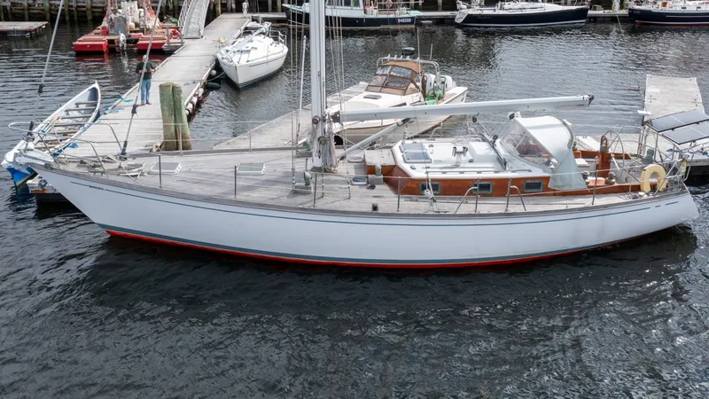 Slide: The Image of 1987 Wittholtz/Luzier 49 | Destiny 1987 Custom Wittholtz/Luzier Sloop/Cutter docked at a marina, showcasing elegant design and craftsmanship. - 6318979