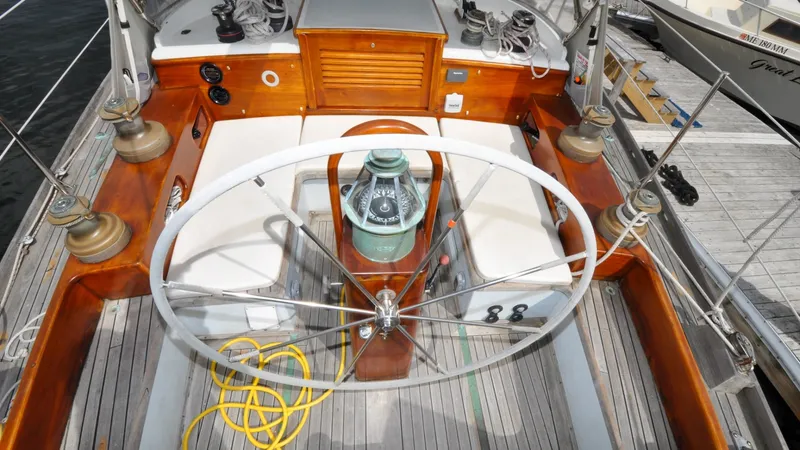 Slide: The Image of 1987 Wittholtz/Luzier 49 | Destiny Cockpit of 1987 Custom Wittholtz/Luzier Sloop/Cutter with wooden accents and steering wheel. - 6318990