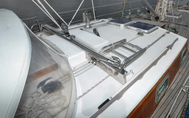 Slide: The Image of 1987 Wittholtz/Luzier 49 | Destiny 1987 Custom Wittholtz/Luzier Sloop/Cutter deck with rigging and hatches, showcasing nautical craftsmanship. - 6318996