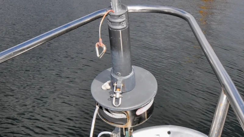 Slide: The Image of 1987 Wittholtz/Luzier 49 | Destiny Stainless steel rigging on 1987 Custom Wittholtz/Luzier Sloop/Cutter sailboat, docked on calm water. - 6319002