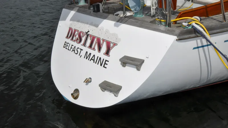 Slide: The Image of 1987 Wittholtz/Luzier 49 | Destiny Stern of 1987 Custom Wittholtz/Luzier Sloop/Cutter "Destiny" docked in Belfast, Maine. - 6318984