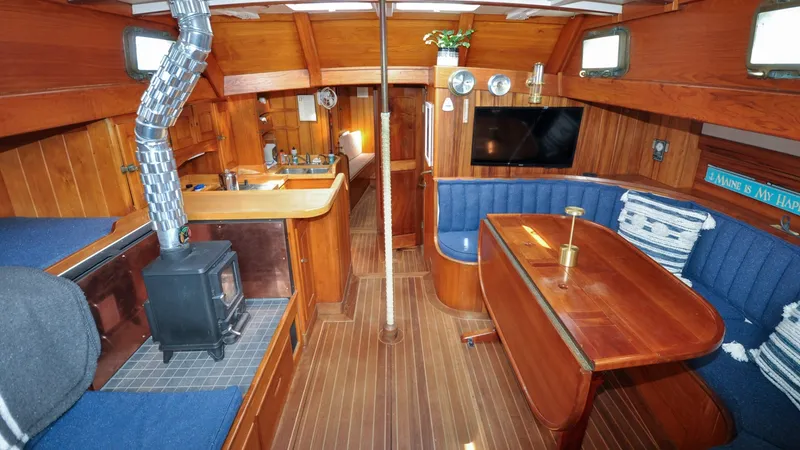 Slide: The Image of 1987 Wittholtz/Luzier 49 | Destiny Interior of 1987 Custom Wittholtz/Luzier Sloop/Cutter with wood finish and cozy seating area. - 6319007