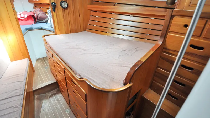 Slide: The Image of 1987 Wittholtz/Luzier 49 | Destiny Cozy wooden cabin interior of 1987 Custom Wittholtz/Luzier Sloop/Cutter with built-in storage. - 6319022